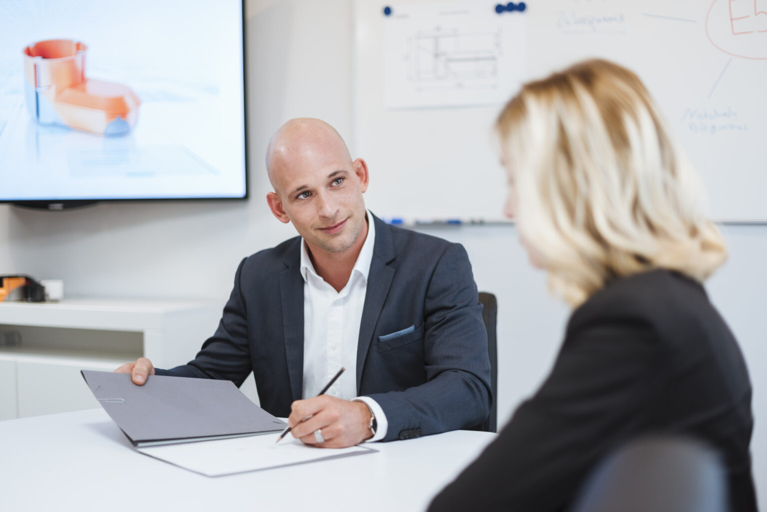 Advisor meeting with a business owner